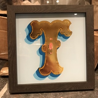 Handwritten glass letters