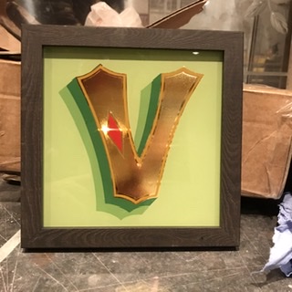Signwritten and gilded glass 